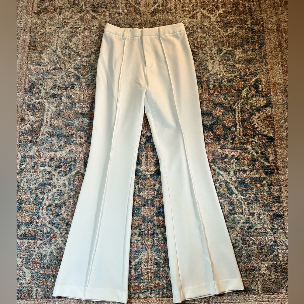 Because of Alice beautiful never worn white trousers. High rise, flare